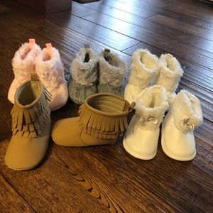 Lot of baby girl boots.
